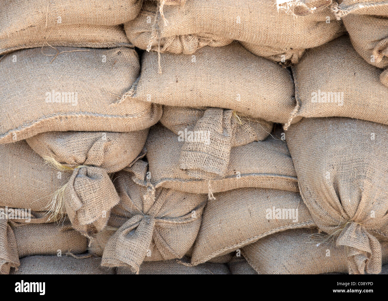 lots of sandbags all piled ready and waiting Stock Photo