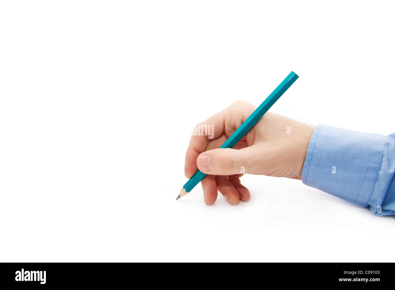 Male hand holding a pencil and writing something on a white background ...