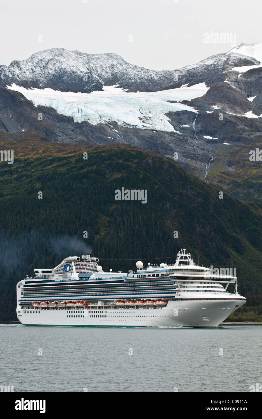 The Sapphire Princess cruise ship leaves port at Whittier bound for the open waters of the Prince William Sound, Alaska Stock Photo