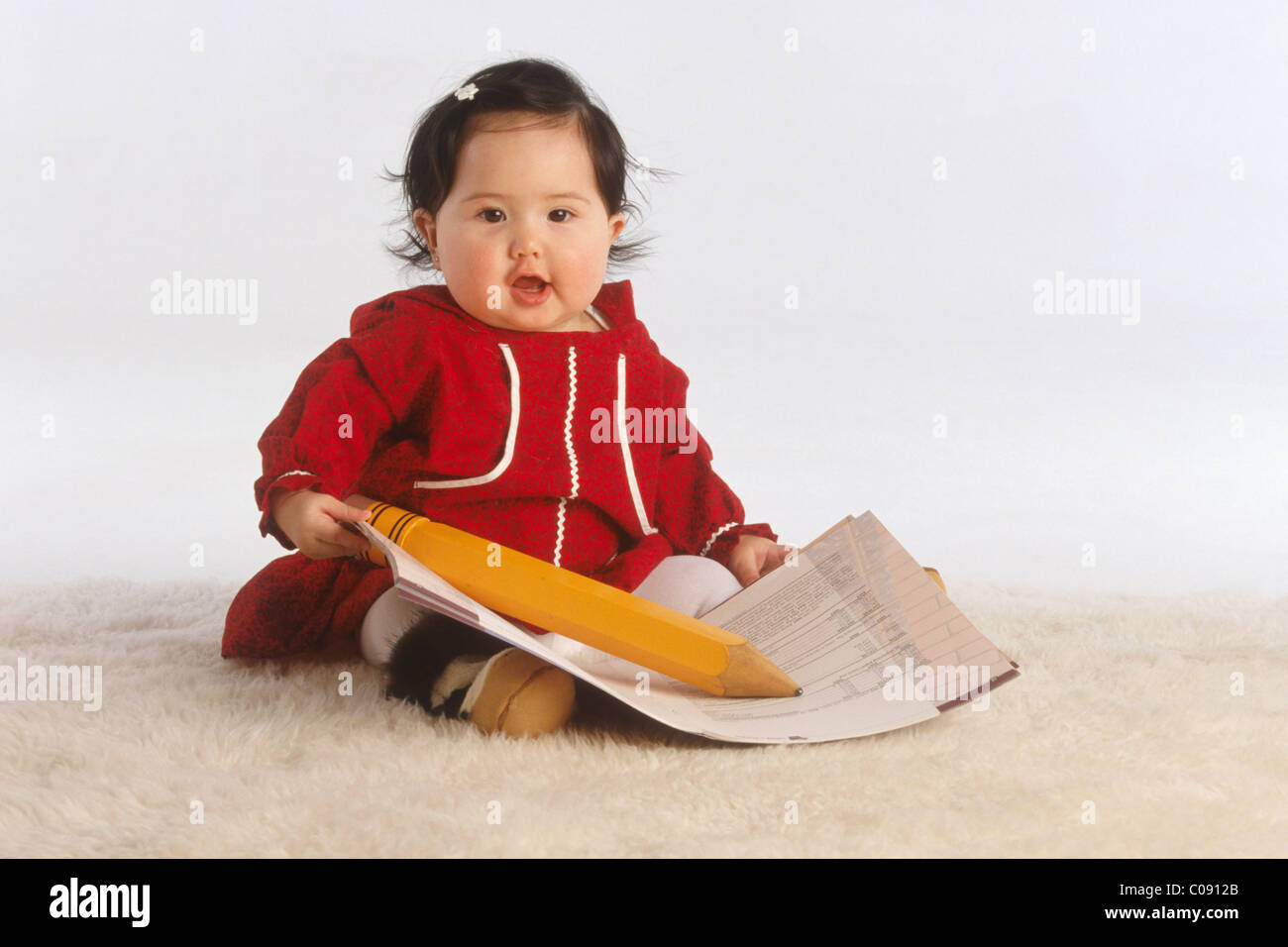 Yupik Eskimo Twins in Studio with various props, Anchorage, Southcentral Alaska Stock Photo
