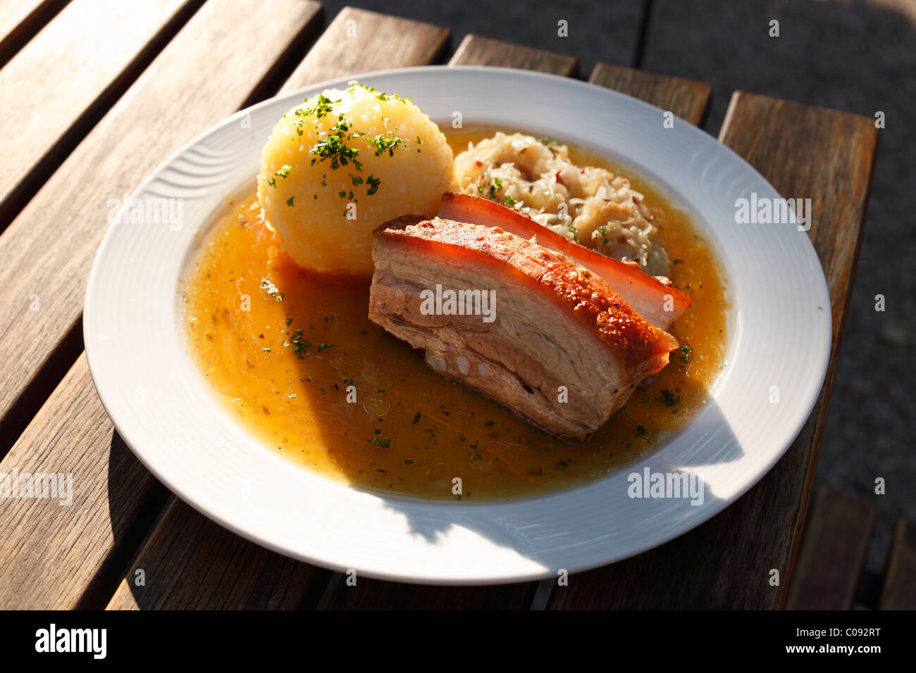 Roast pork with dumpling and sauerkraut, Upper Franconia, Franconia, Bavaria, Germany, Europe Stock Photo