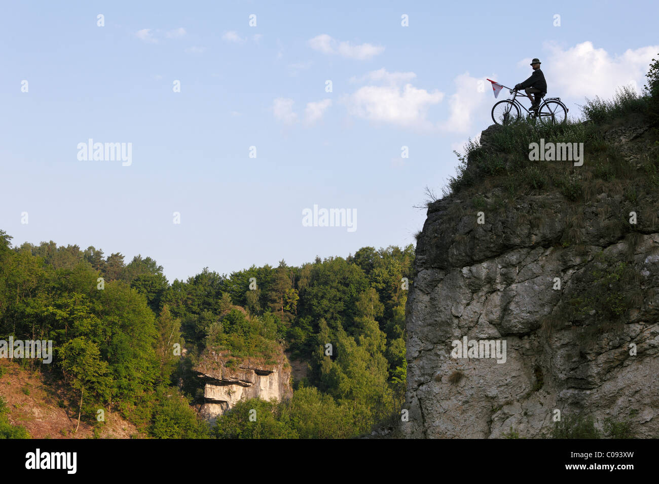 Cyclist sculpture on a cliff, Kleinziegenfeld, Kleinziegenfeld Valley, Franconian Switzerland, Franconian Alb, Upper Franconia Stock Photo