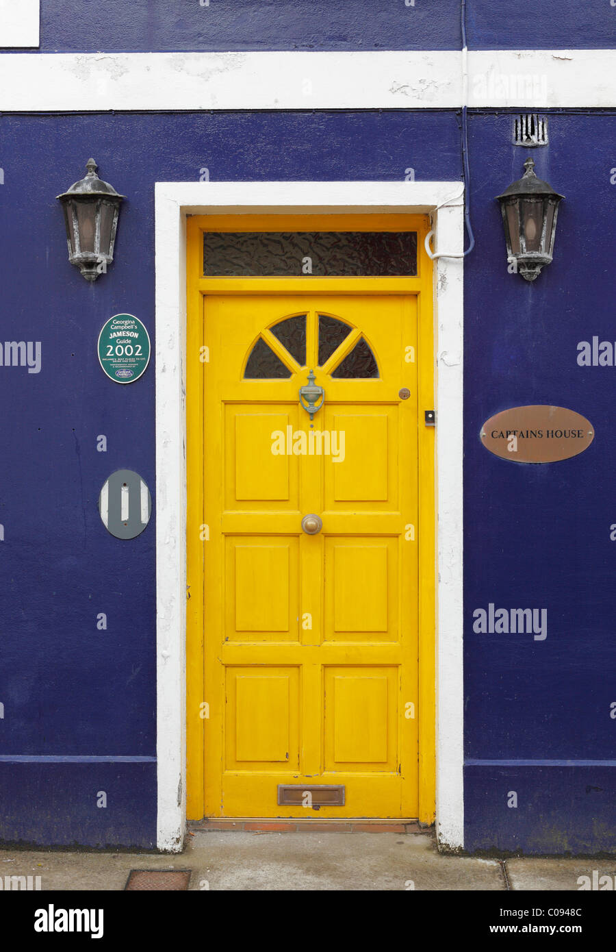 Yellow front door, Captain's House, Dingle, County Kerry, Ireland, British Isles, Europe Stock Photo