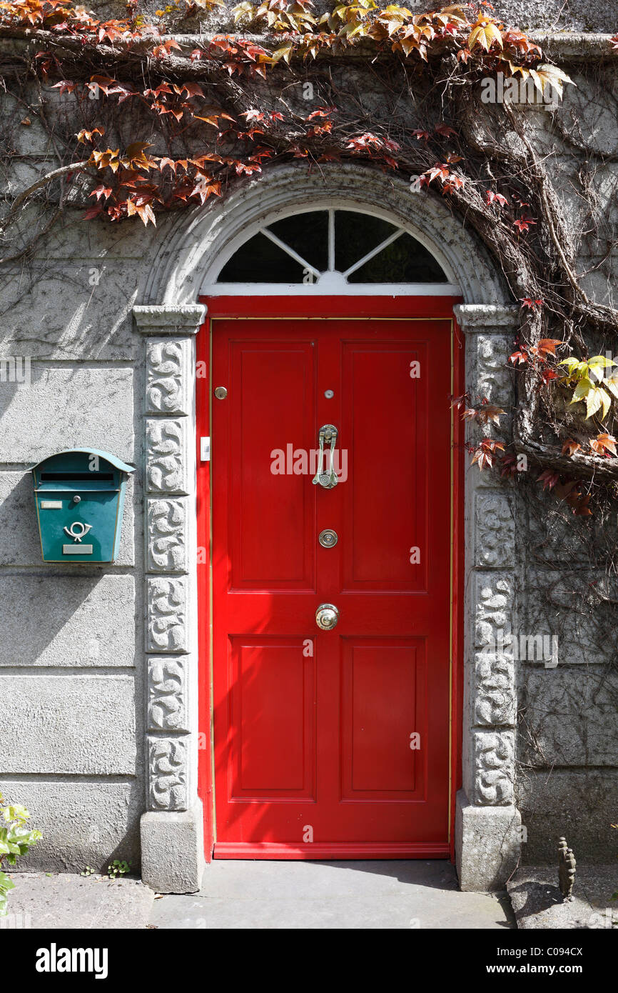 Red front door, Adare, County Limerick, Ireland, British Isles, Europe Stock Photo