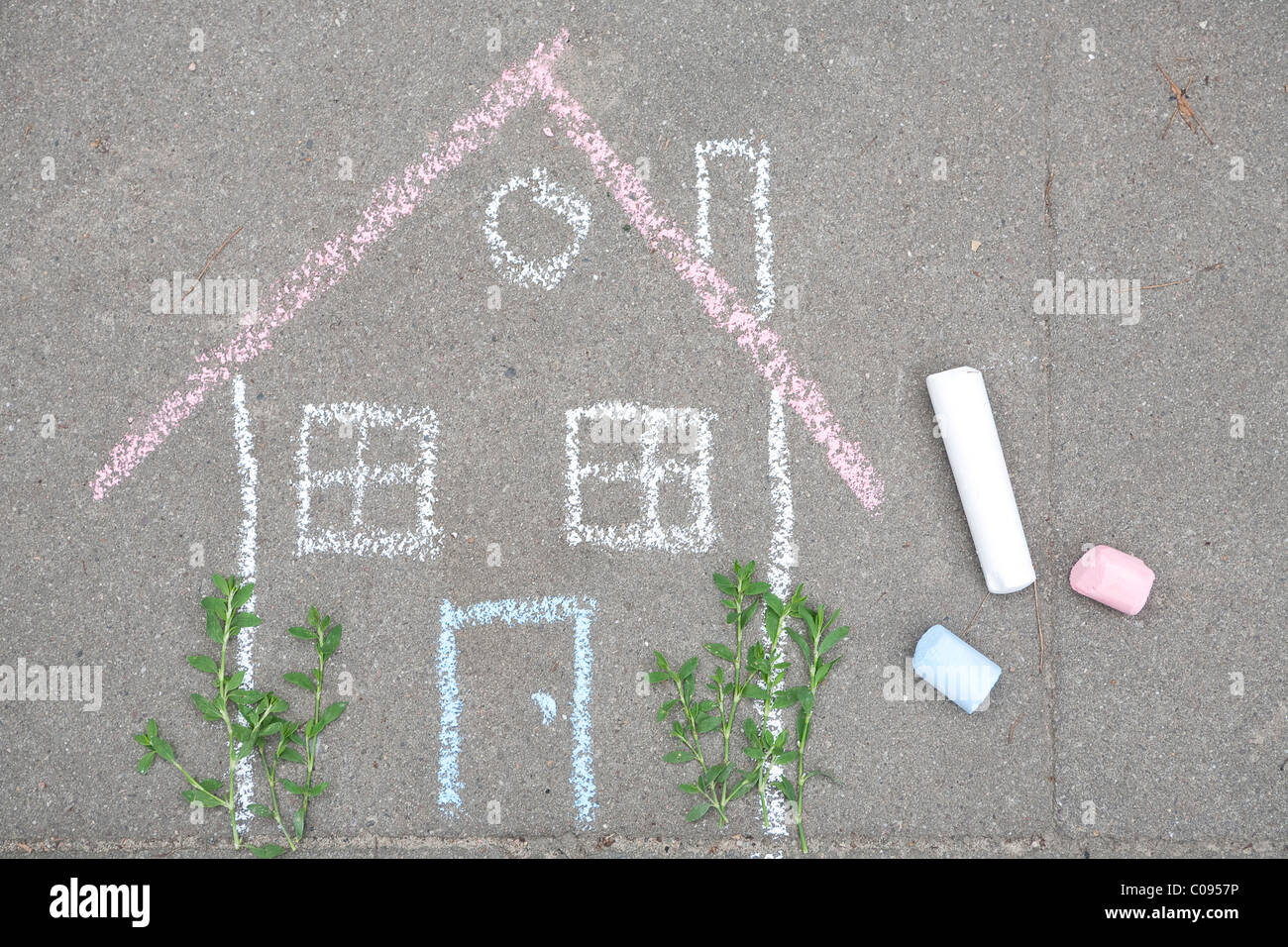 Chalk drawing on the street, house, symbolic image private home Stock Photo
