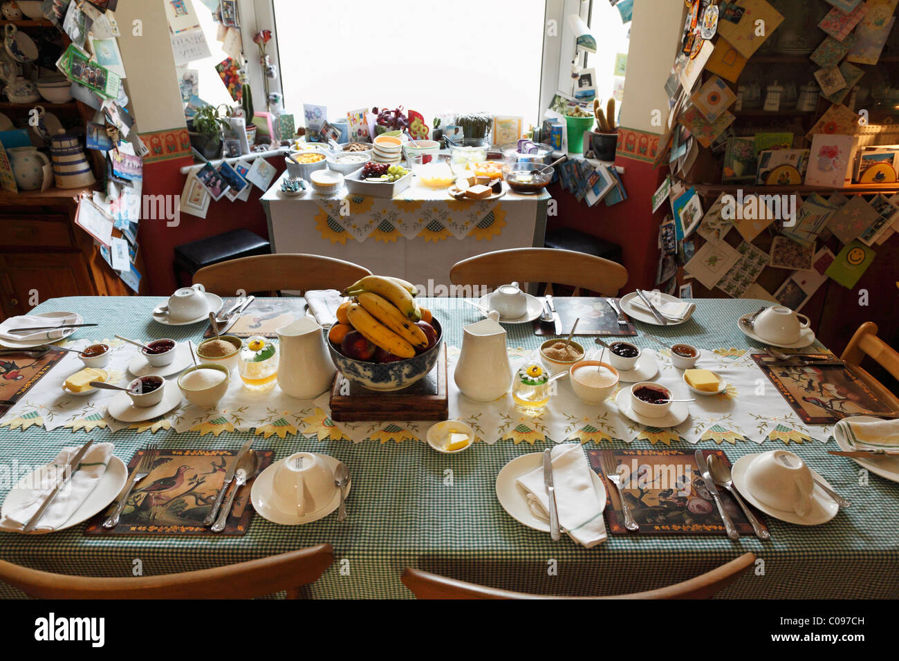 Set breakfast table in the The Olde Bakery Bed and Breakfast, Kinsale, County Cork, Republic of Ireland, British Isles, Europe Stock Photo