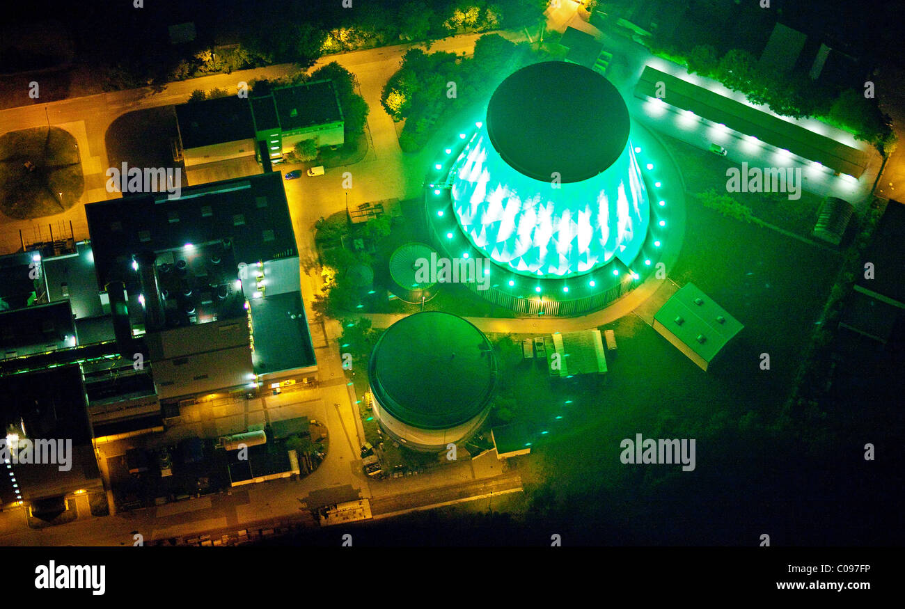 Aerial view at night, cooling tower, power plant of Stadtwerke Duisburg, the Duisburg municipal utility, Logport Logistic Center Stock Photo