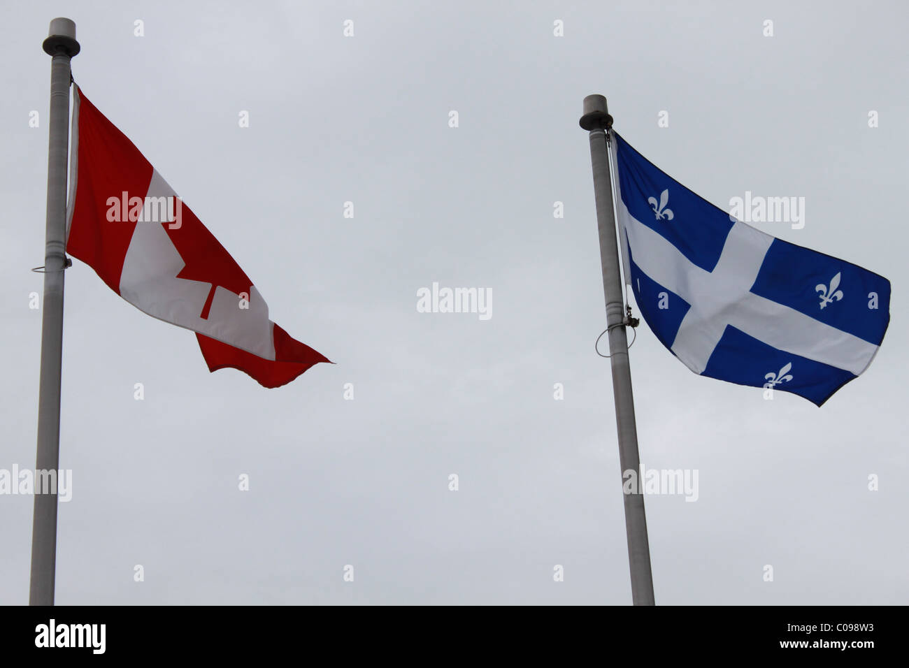 Two flags Canada and Quebec provincial flag Stock Photo