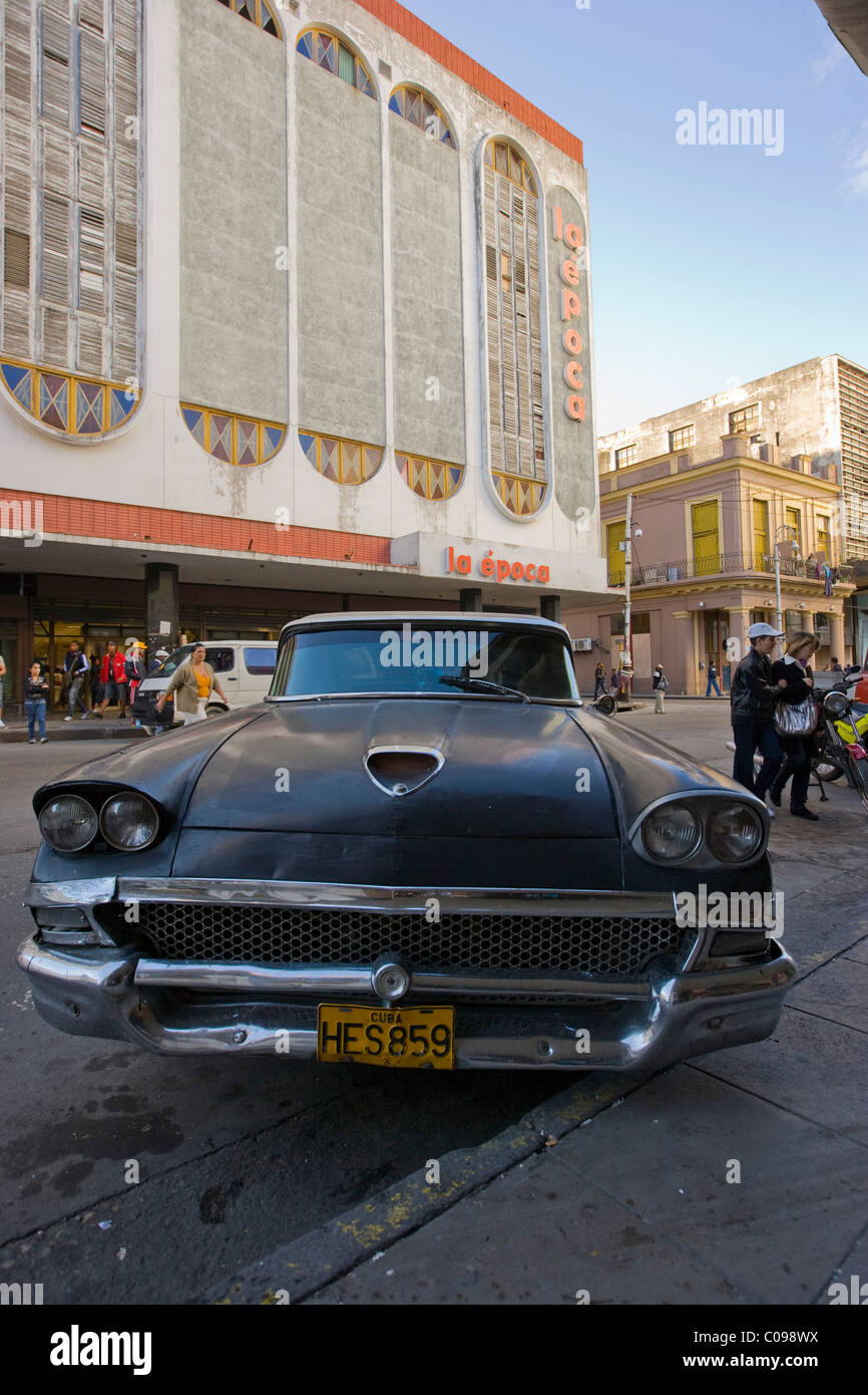 An old American 1950s automobile outside the department store in Havana Cuba Stock Photo