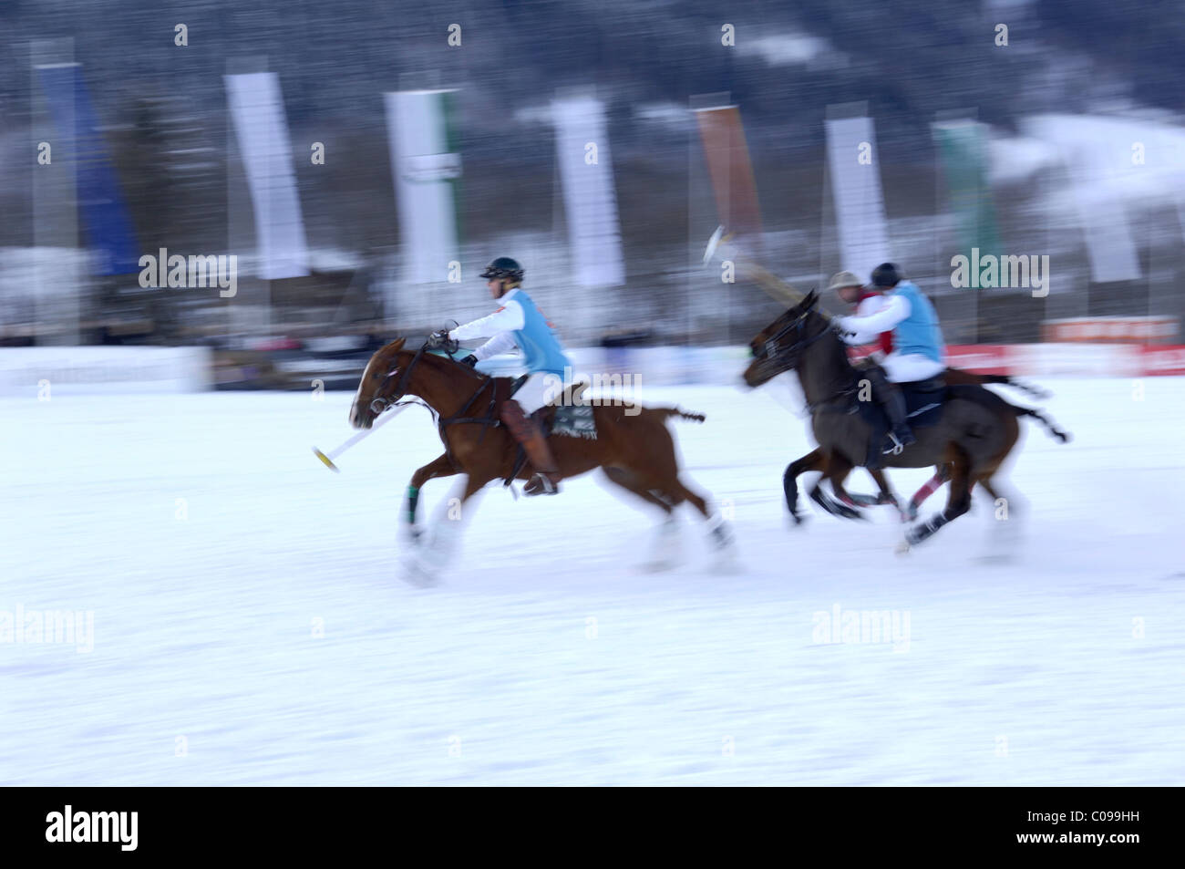 Polo players battling for the ball, Team Wintertechnik against Team Arosa - Eleven Voyage, Snow Arena Polo World Cup 2010 polo Stock Photo