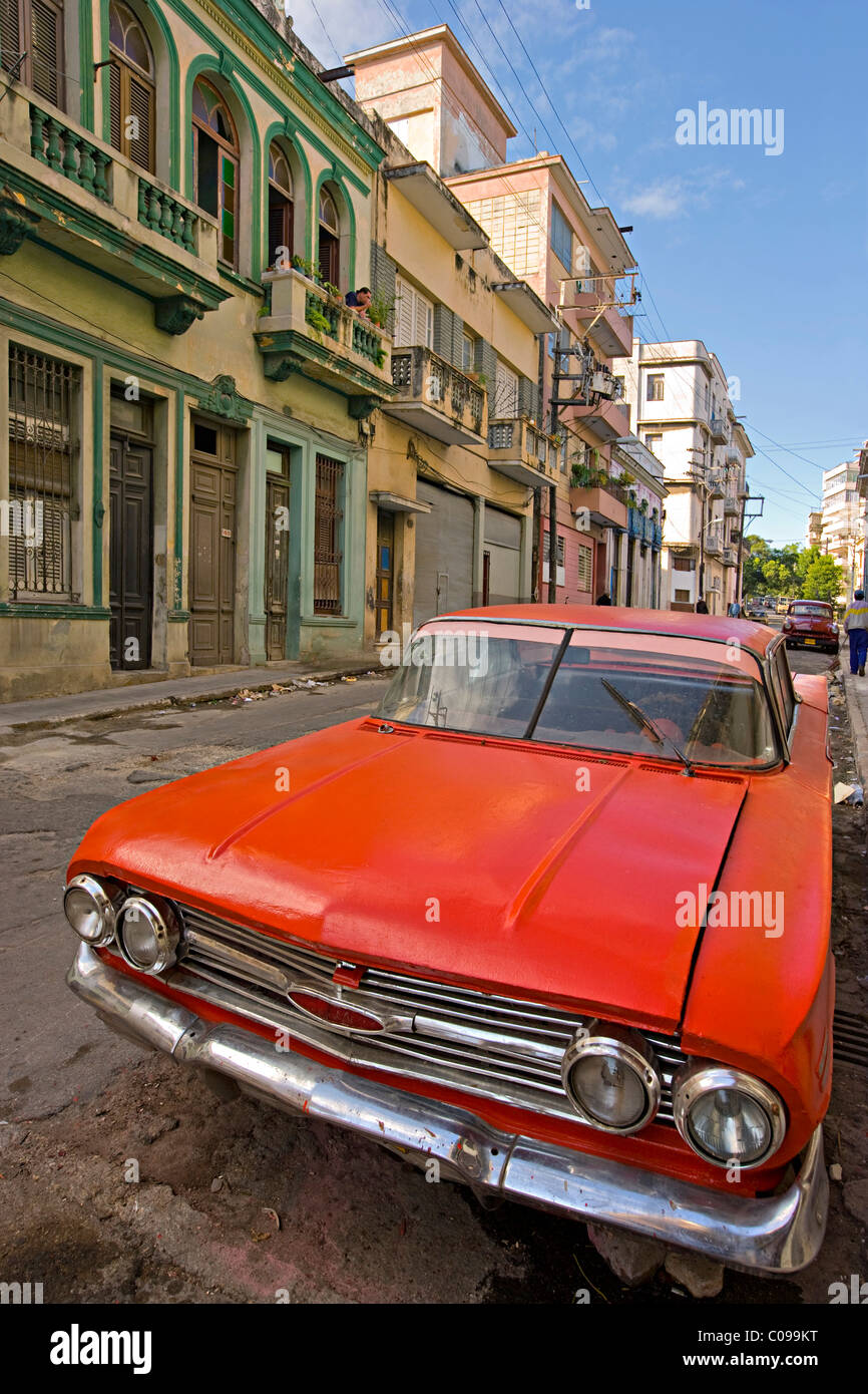 An old American 1950s red automobile in a street in Havana  Cuba Stock Photo