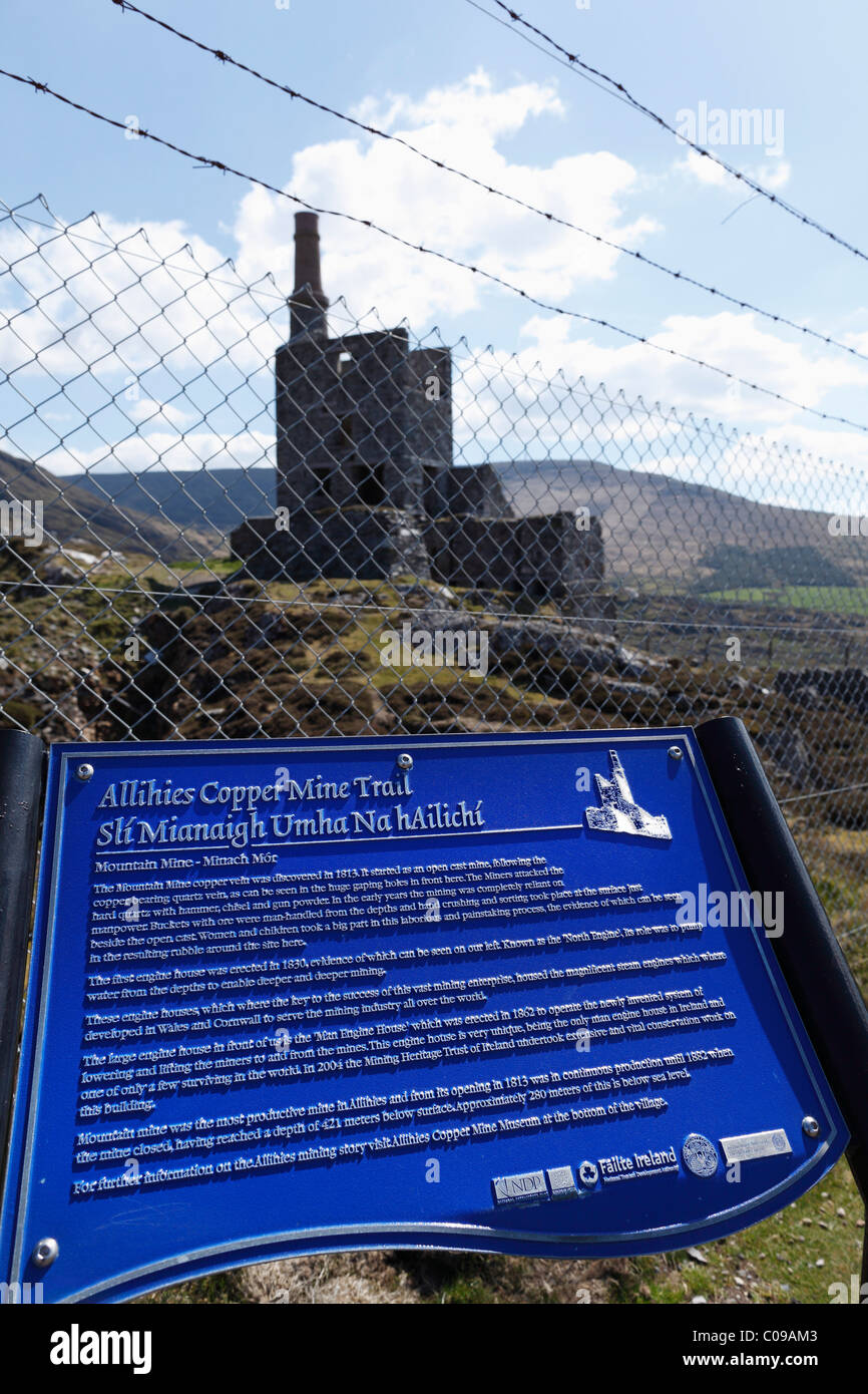 Sign in front of the ruins of the engine room of a copper mine, Allihies, Slieve Miskish Mountains, Beara Peninsula, County Stock Photo