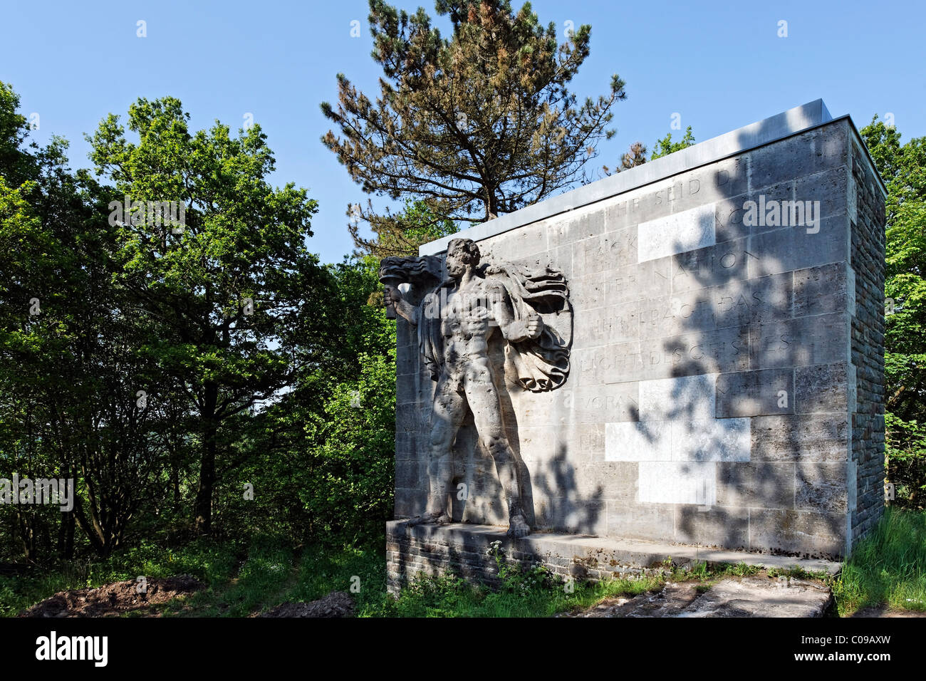 Torchbearer, monumental stone sculpture from the Nazi era, former NS-Ordensburg Vogelsang, International Place in Eifel National Stock Photo