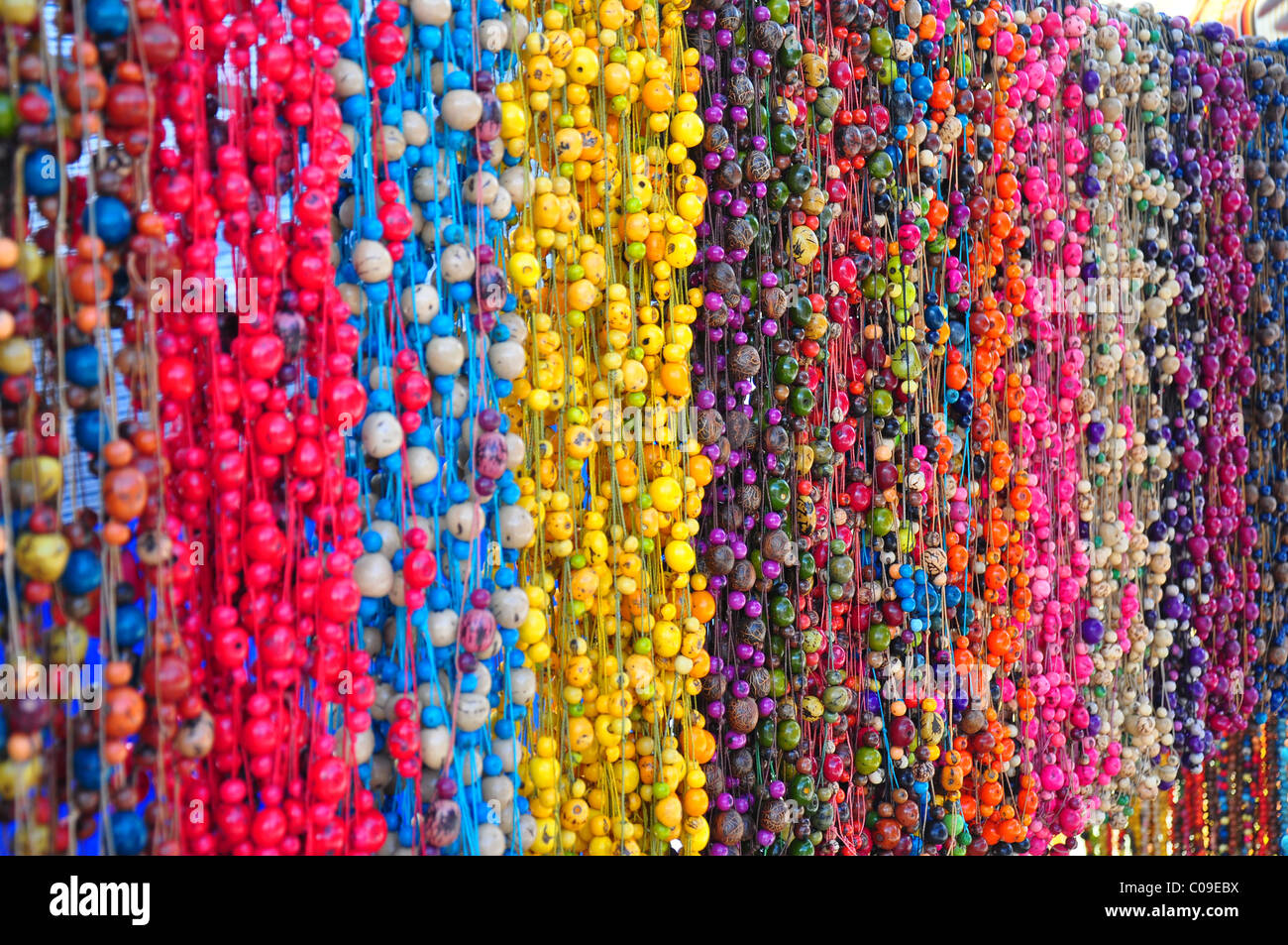 Hanging beads in craft market, Ecuador Stock Photo - Alamy