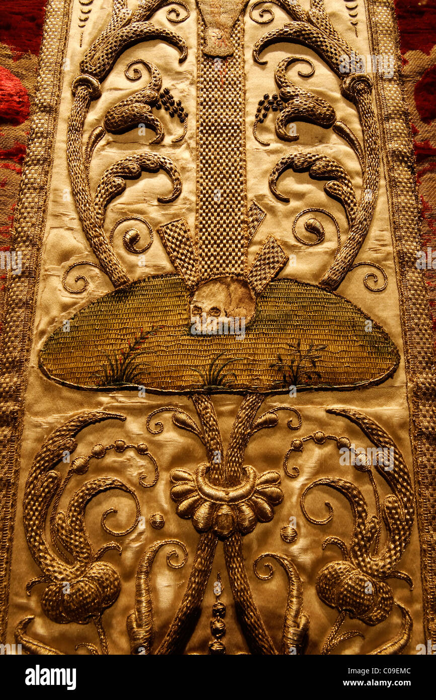 Baroque ornamentation with skull, artful embroidery on a chasuble, historical liturgical garment, Stiftsmuseum Museum Xanten Stock Photo