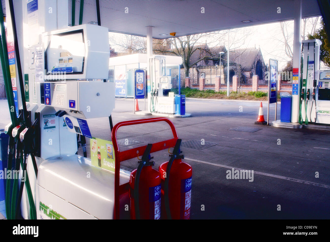 An empty petrol station forecourt with unleaded and diesel fuel closed
