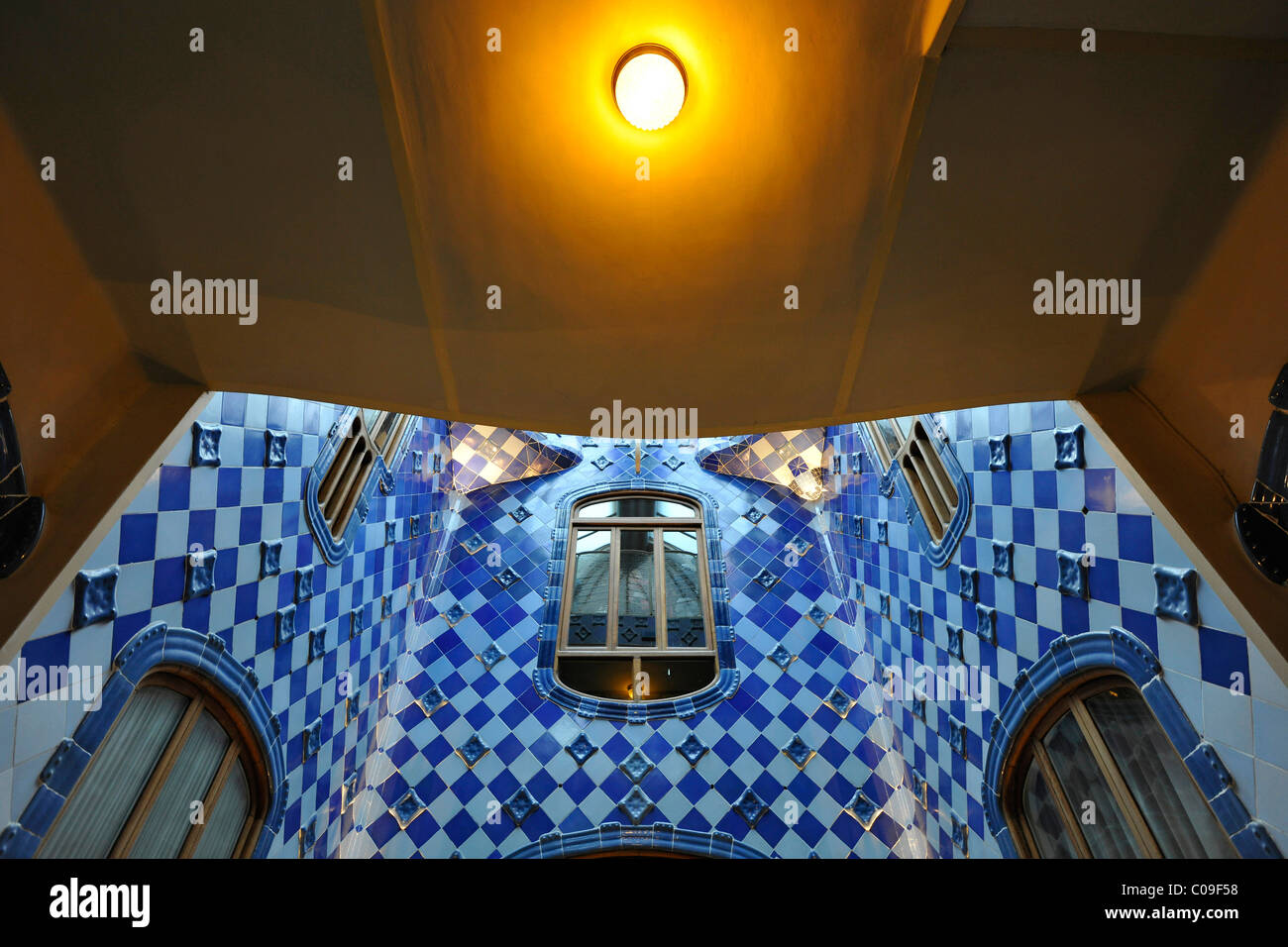Interior view of the lighting of the stairwell, Casa Batllo building, designed by Antoni Gaudi, UNESCO World Heritage Site Stock Photo