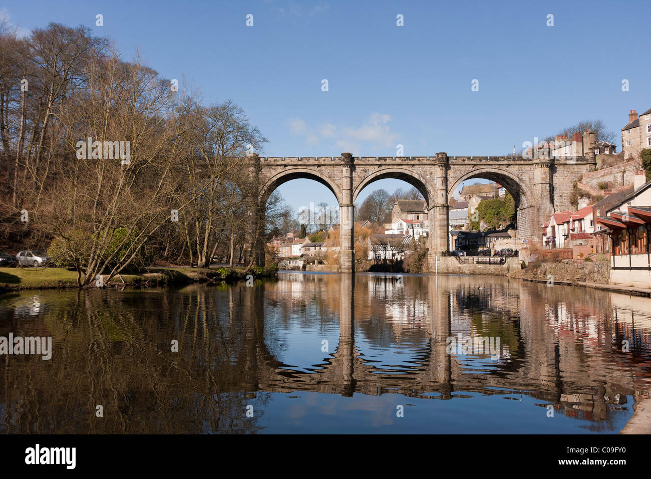Sunny day looking down river at the viaduct in Knaresborough. Stock Photo