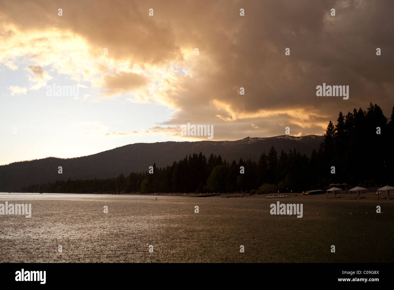Late-afternoon raincloud drops downpour into Lake Tahoe near Incline Village, Nevada, USA Stock Photo