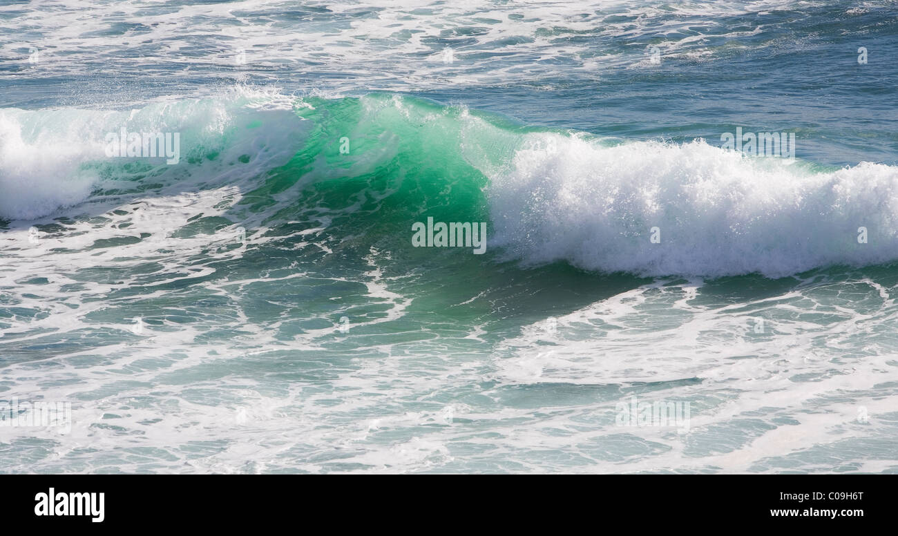Aquamarine coloured breaking waves Stock Photo