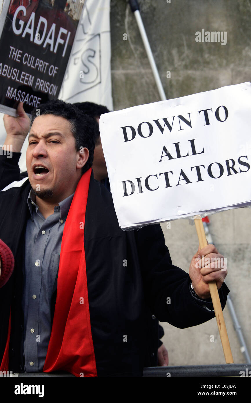 Anti Colonel Gaddafi demonstrator at Libyan Embassy London Stock Photo