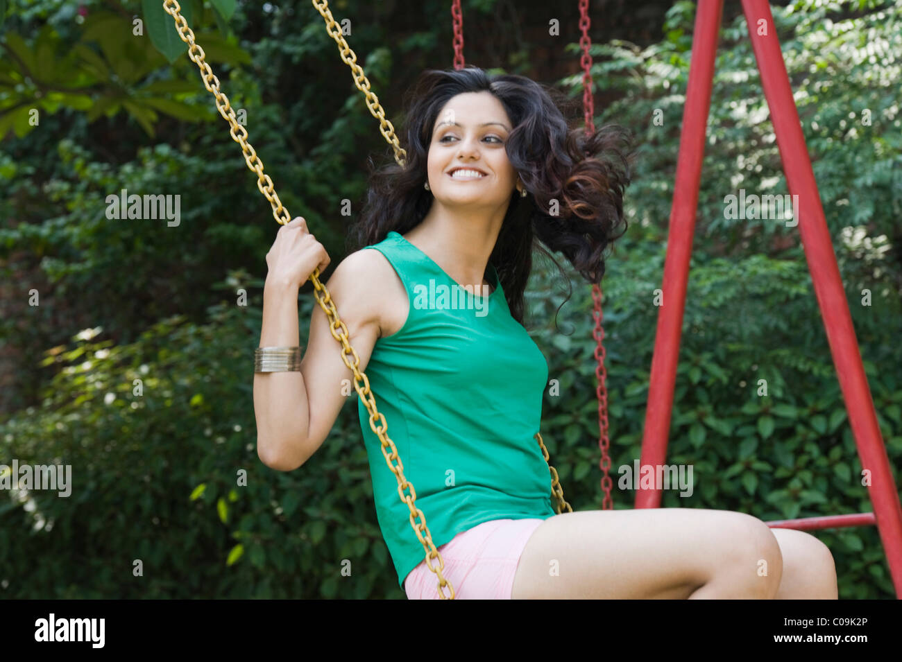 Woman on swing india hi-res stock photography and images - Alamy