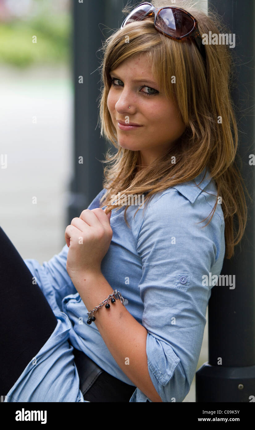 Beautiful blonde woman leans hi-res stock photography and images - Alamy