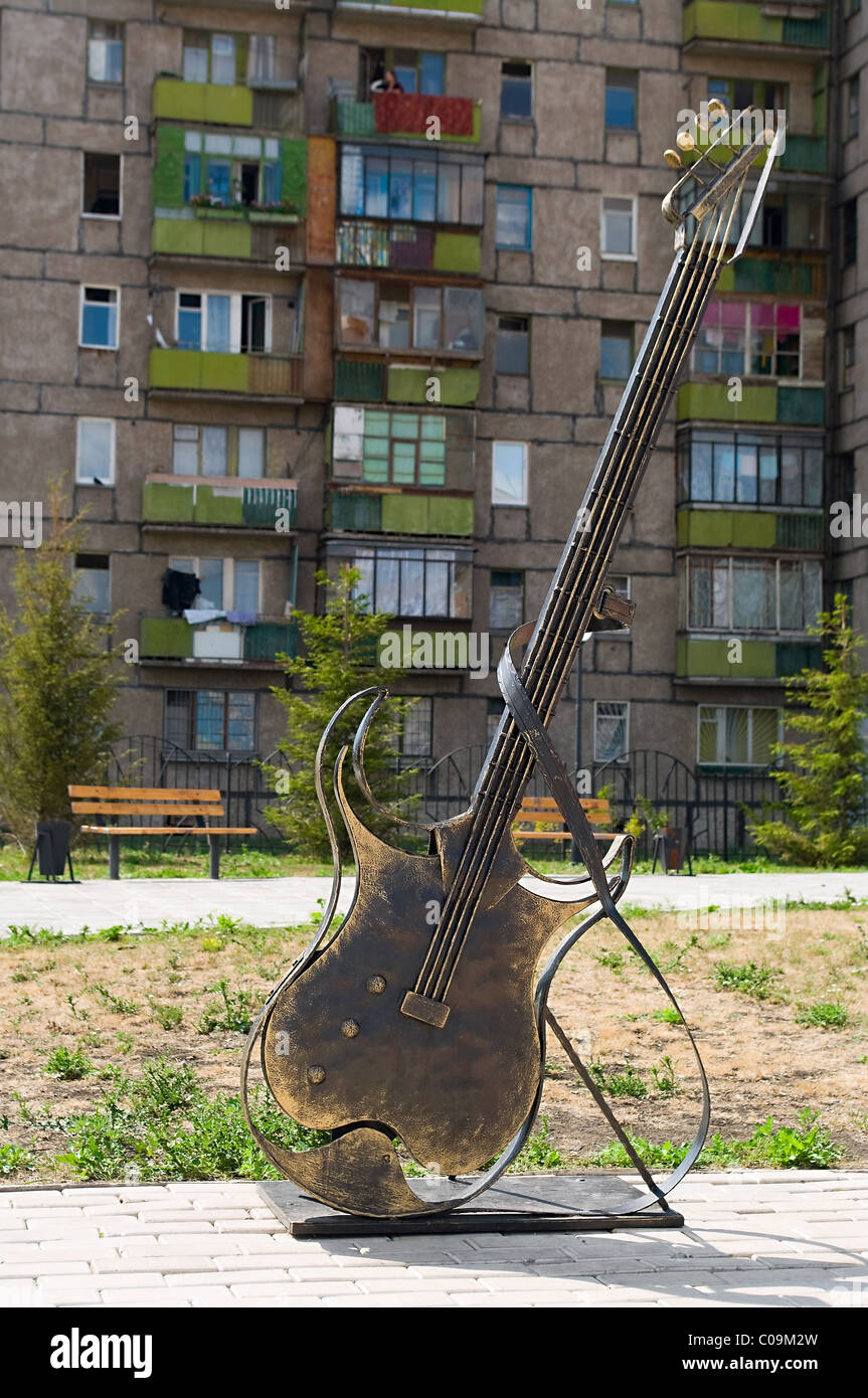 Musical statues a instruments from bronze in street of Chelyabinsk