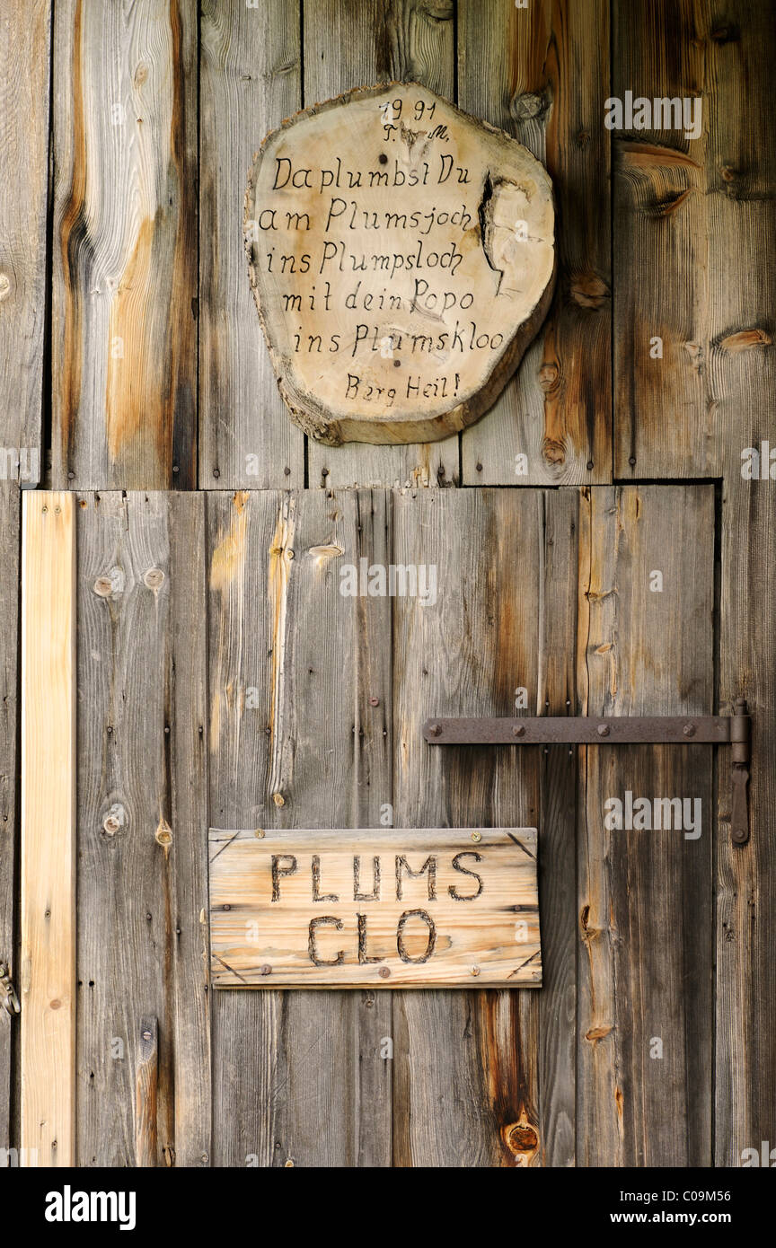 Plumsklo or squat toilet at the Plumsjochhuette alpine hut on Mt. Plumsjoch in the Rissbachtal, Karwendelgebirge mountains Stock Photo