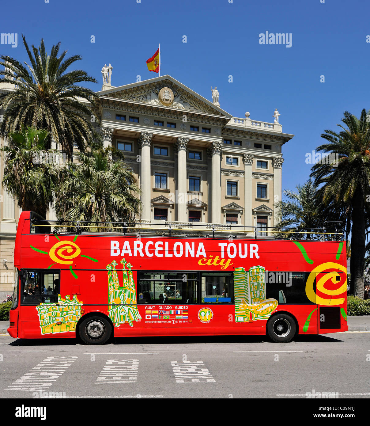 Double-decker bus, sightseeing bus, hop-on hop-off bus in front of the port authority, Port de Barcelona, Port Vell, Barcelona Stock Photo