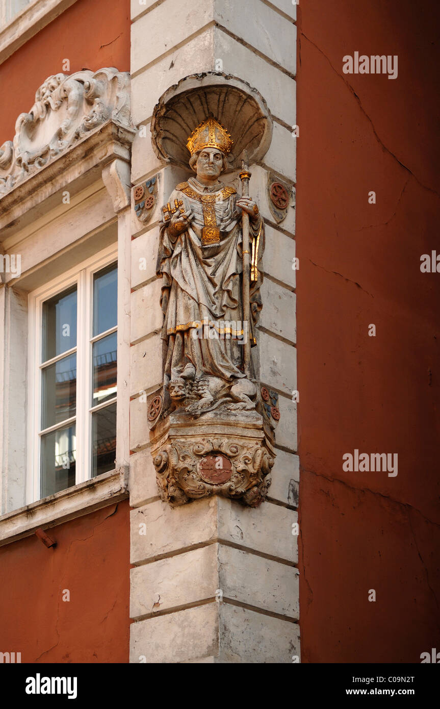 Saints figure with lion, St. Hieronymus or St. Jerome, church father, on a corner house, Hauptstrasse 130, Heidelberg Stock Photo