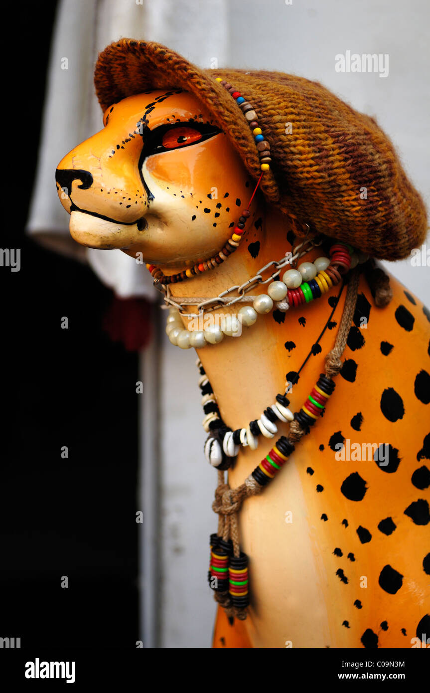 Decoration, figure of a Leopard with a knitted cap and jewelry in front of a fashion shop, Heidelberg, Baden-Wuerttemberg Stock Photo