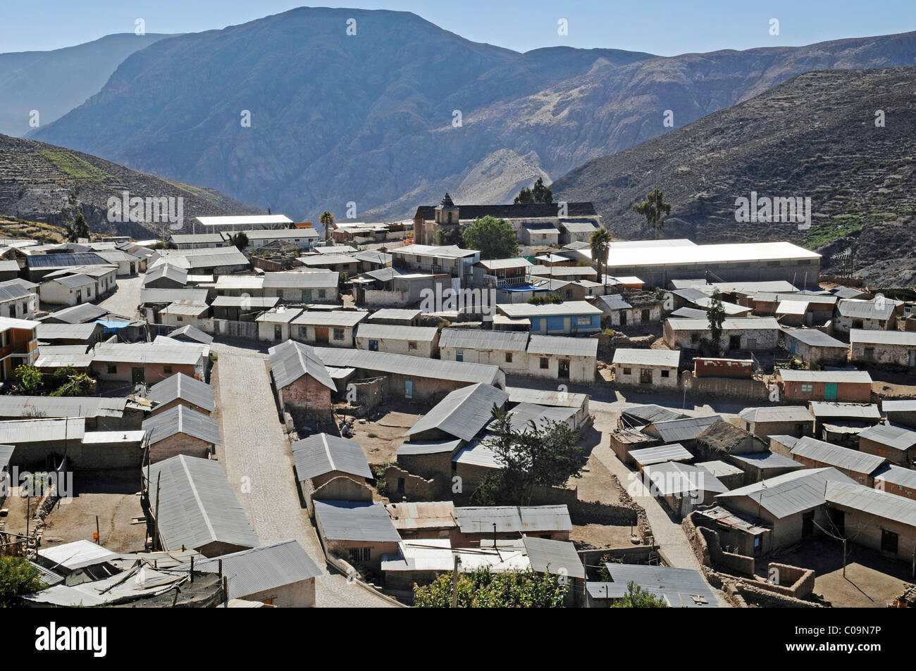 Overview, corrugated iron roofs, houses, mountains, Socoroma village, Putre, Altiplano, Norte Grande, northern Chile, Chile Stock Photo