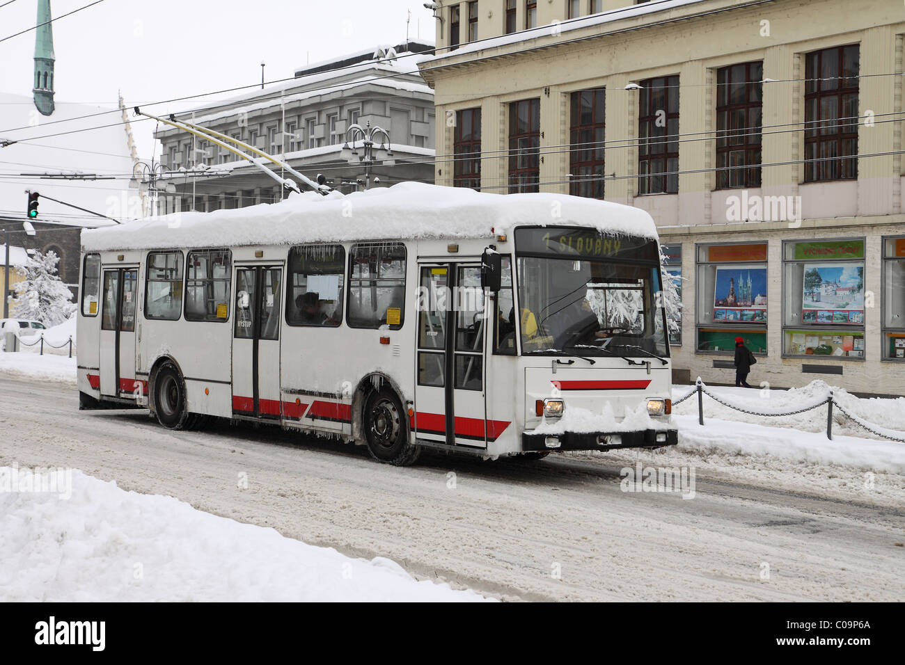 Czech Republic - city Pardubice, square Namesti Republiky - trolleybus in winter with snow Stock Photo