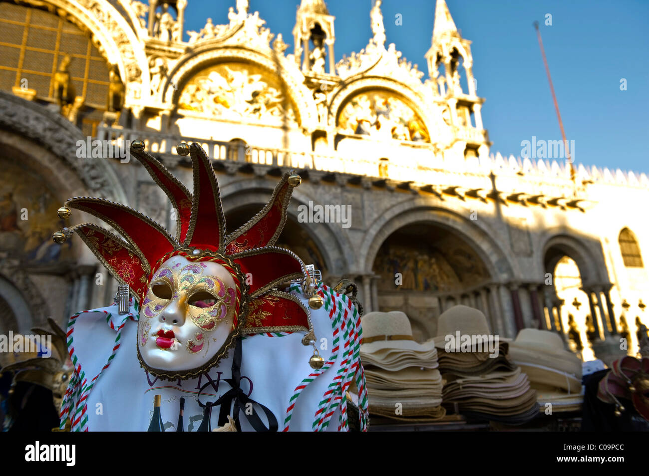 Venetian mask at a souvenir stall in St. Mark's Square in front of St. Mark's Basilica, Venice, Veneto, Italy, Europe Stock Photo