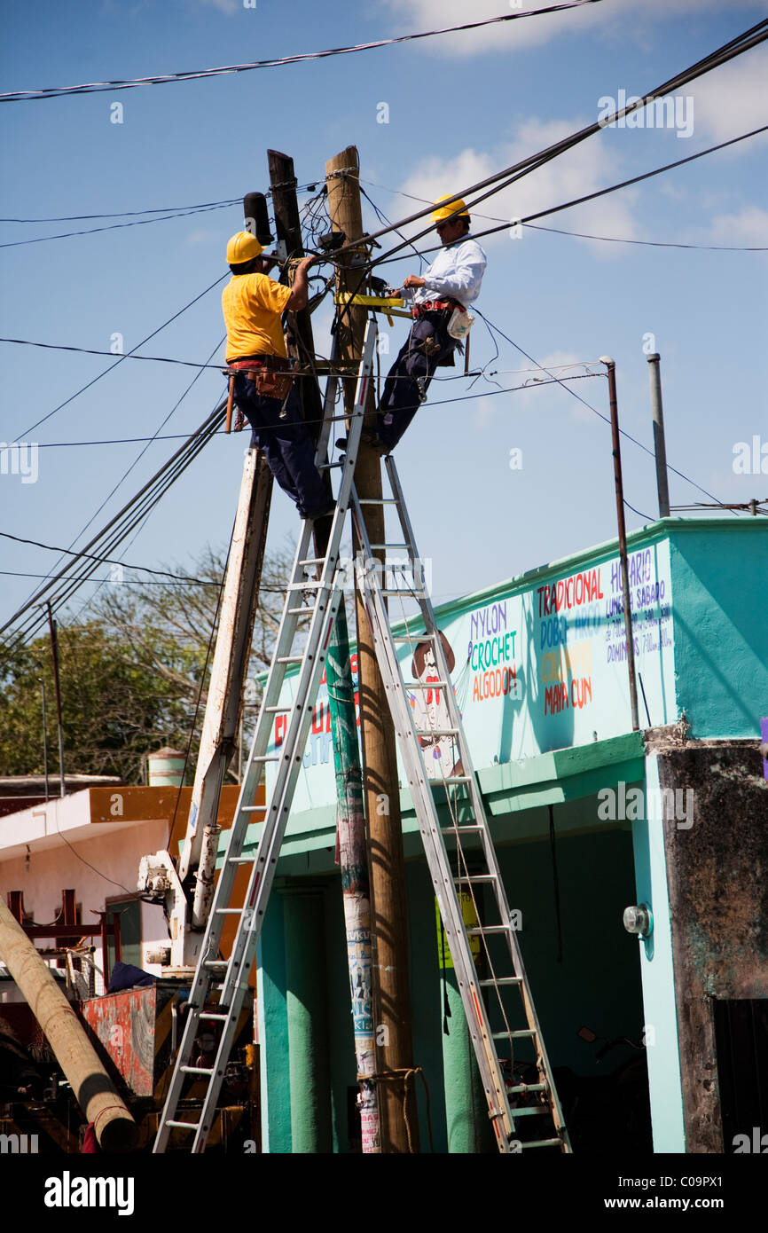 Mexican electricians at work in Yucatan, Mexico Stock Photo Alamy