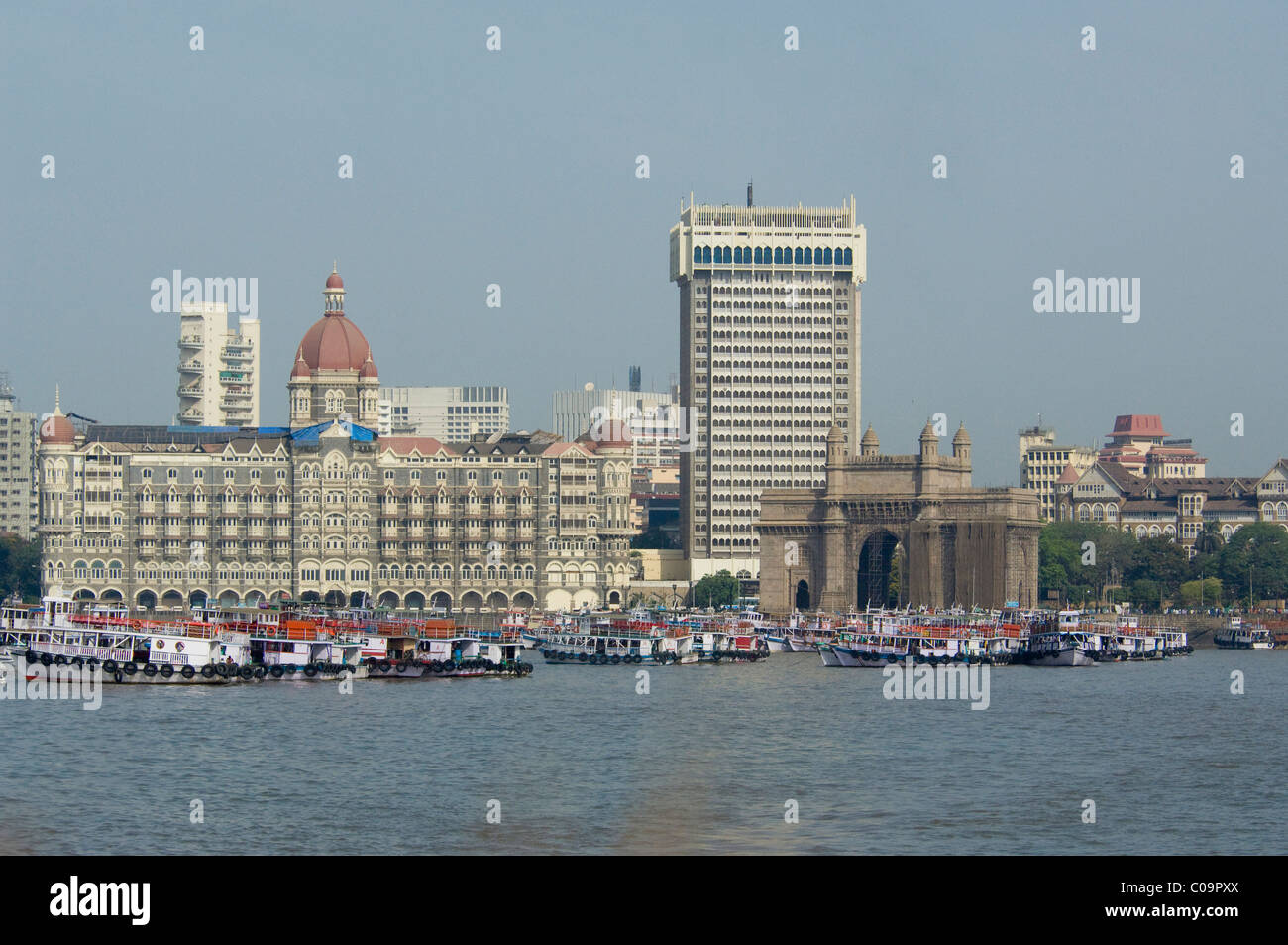 India, state of Maharashtra, Mumbai (aka Bombay). Waterfront area of Mumbai, historic Taj Mahal Hotel & Arch. Stock Photo