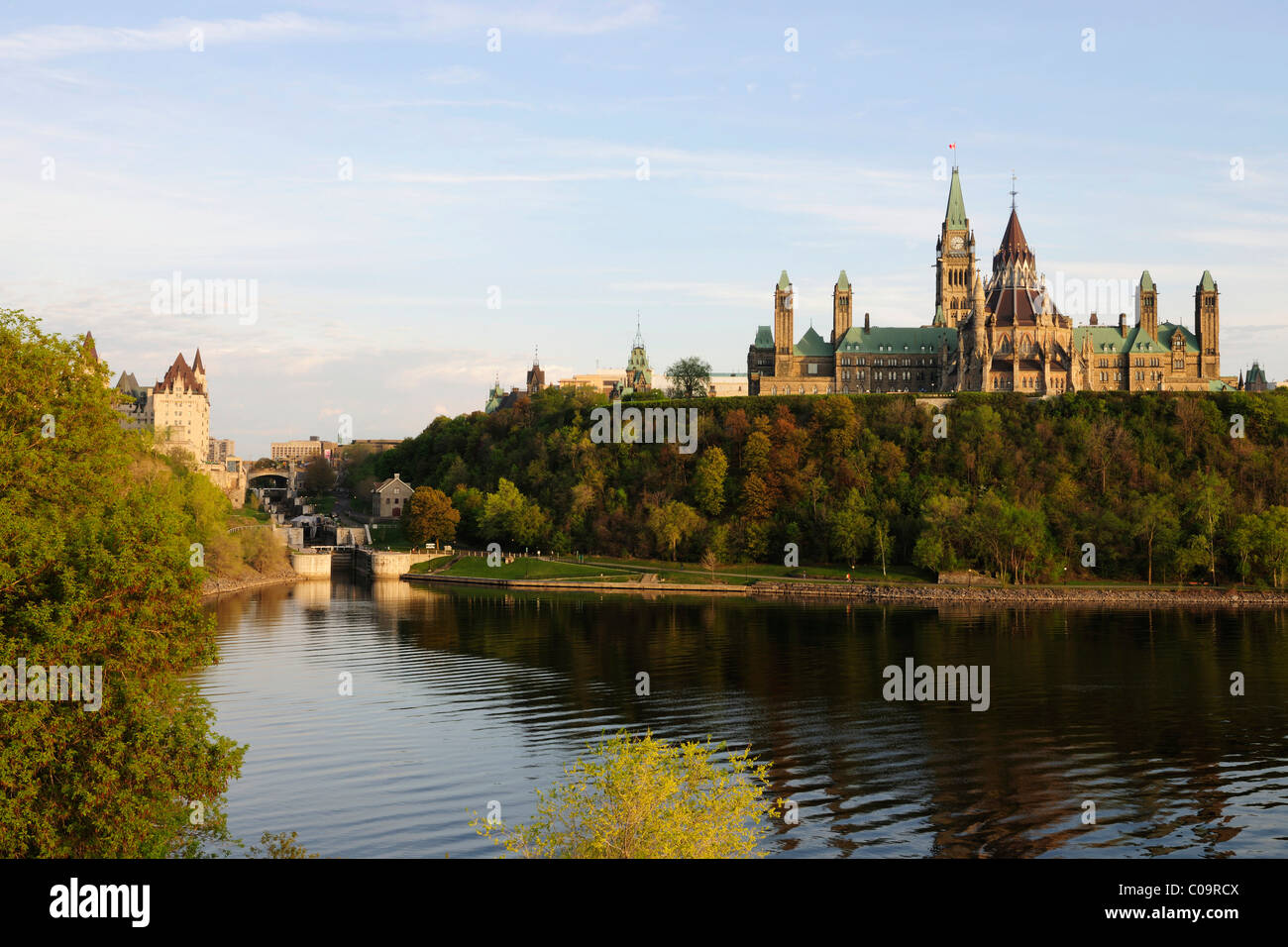 The government buildings on Parliament Hill, on the left the locks at the Rideau Canal, Ottawa, Ontario, Canada Stock Photo