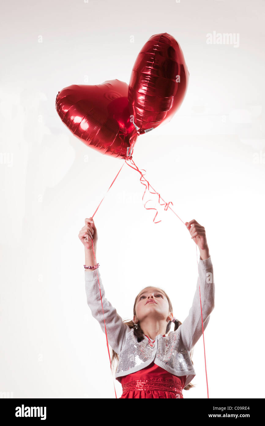 Girl and balloon hires stock photography and images Alamy