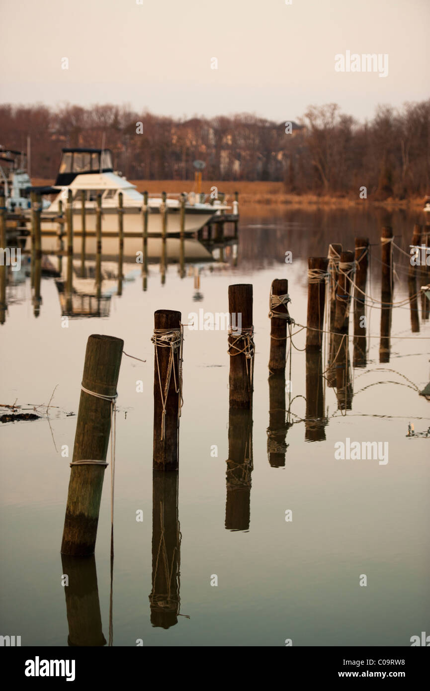 A serene winter landscape of a quiet marina on the Potomac River in Virginia USA. Stock Photo