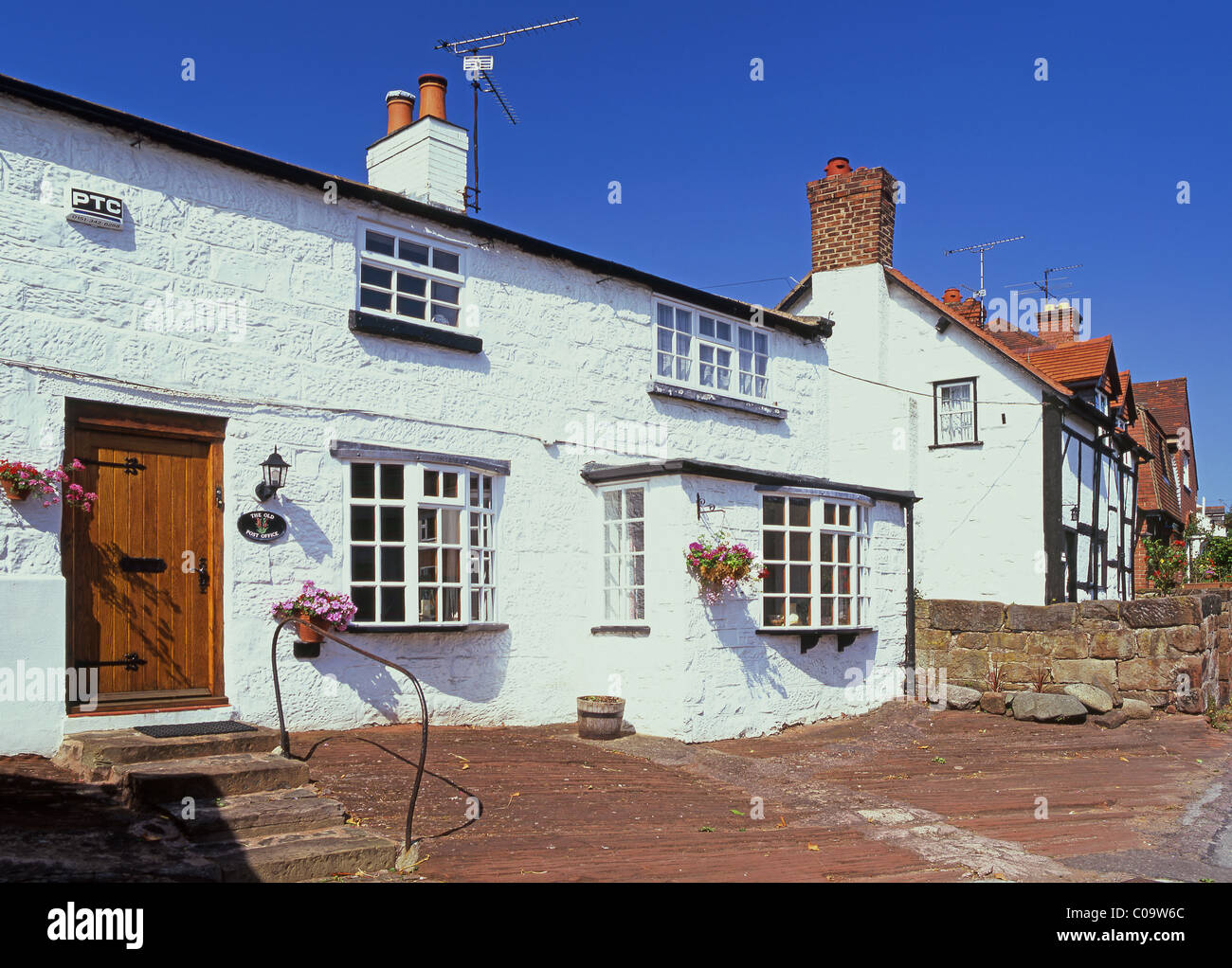 The Old Post Office & Other Attractive Cottages, Village of Burton, The Wirral, Cheshire, England, UK Stock Photo