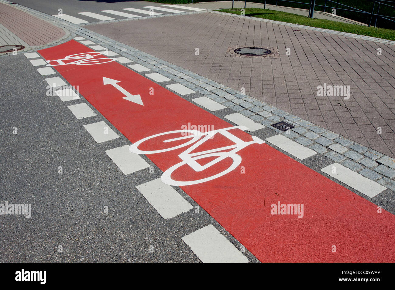 Bicycle path marked with red Stock Photo