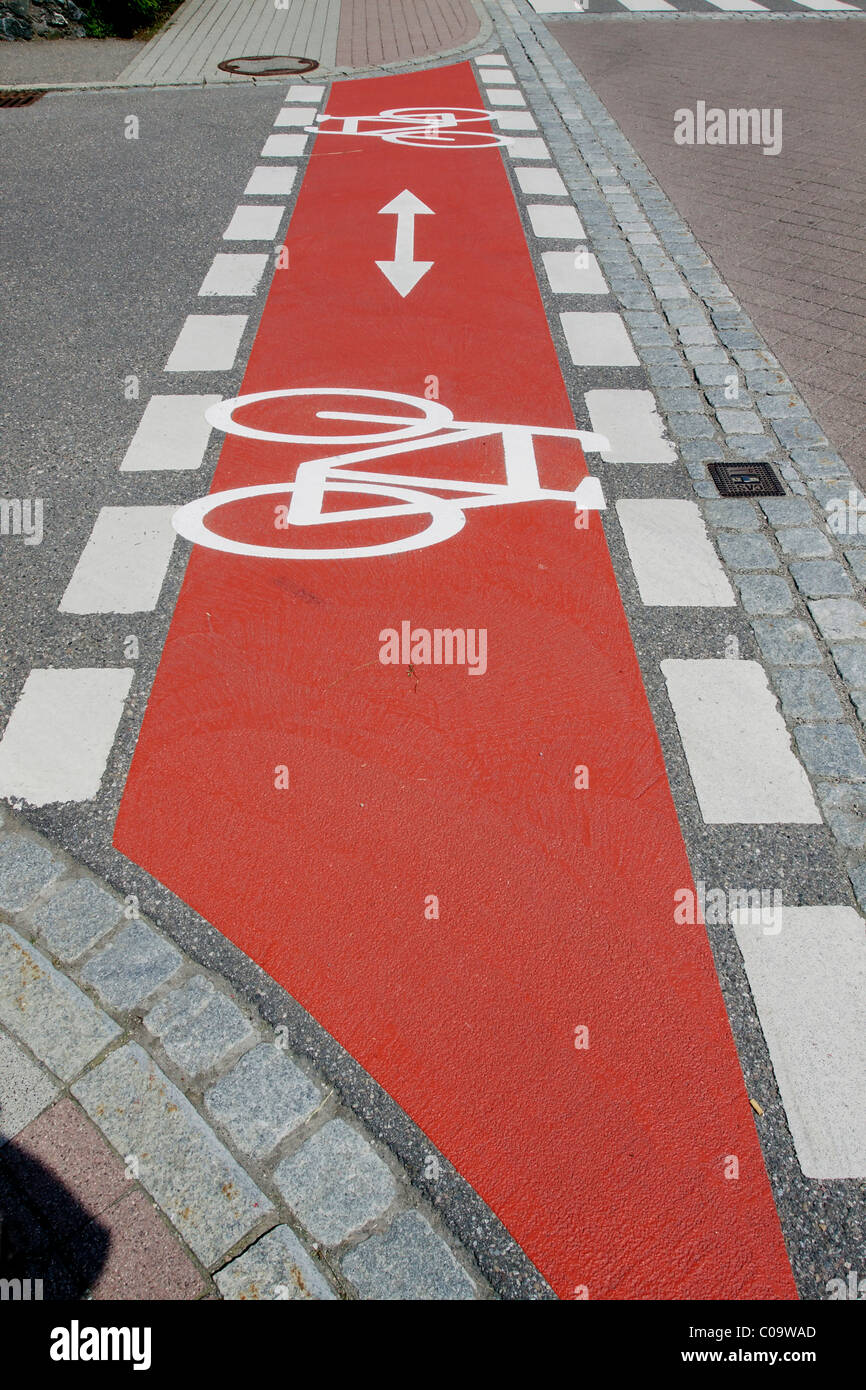 Bicycle path marked with red Stock Photo