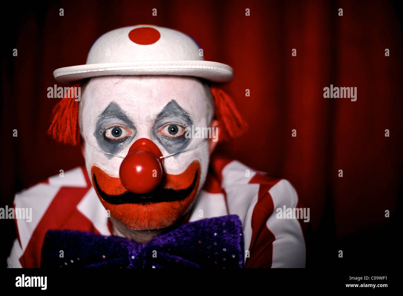 sad circus clown face