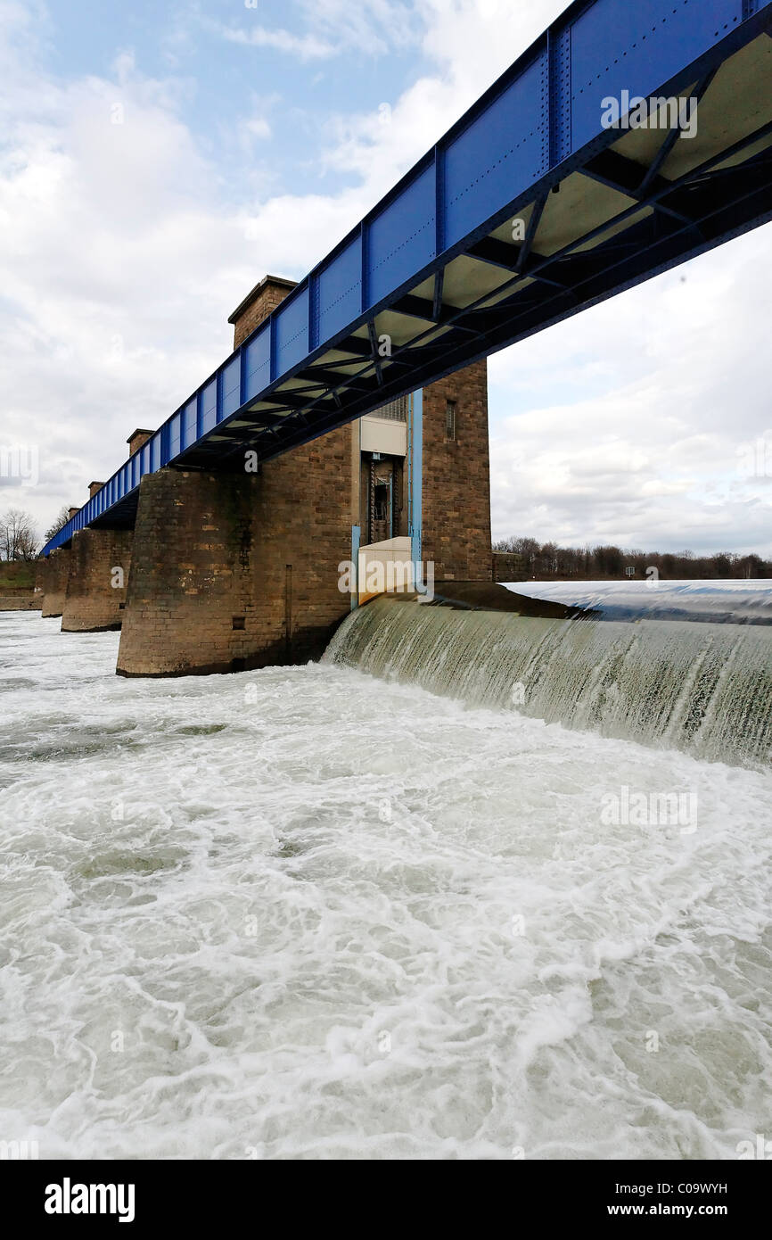 Ruhr river dam and lock, water flowing over the weir, overflow