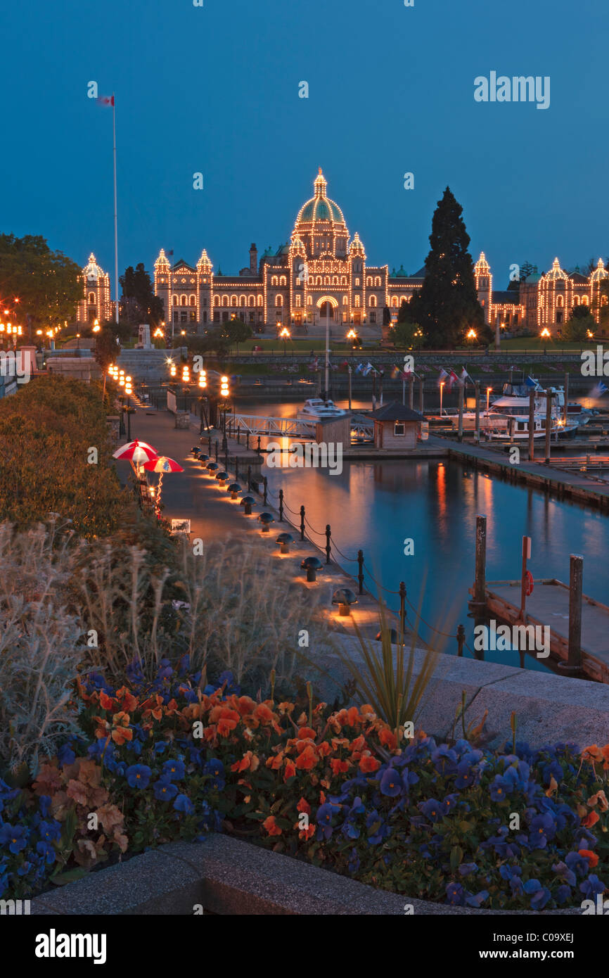 Victoria's Inner Harbour illuminated at twilight with the BC parliament buildings in the background, Victoria, Vancouver Island, Stock Photo