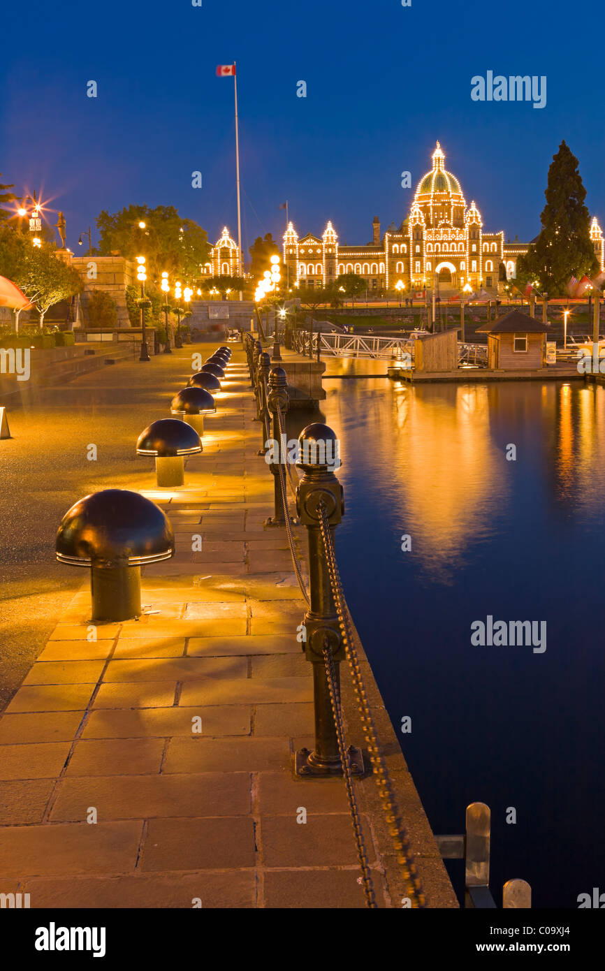 Victoria's Inner Harbour illuminated at twilight with the BC parliament buildings in the background, Victoria, Vancouver Island, Stock Photo