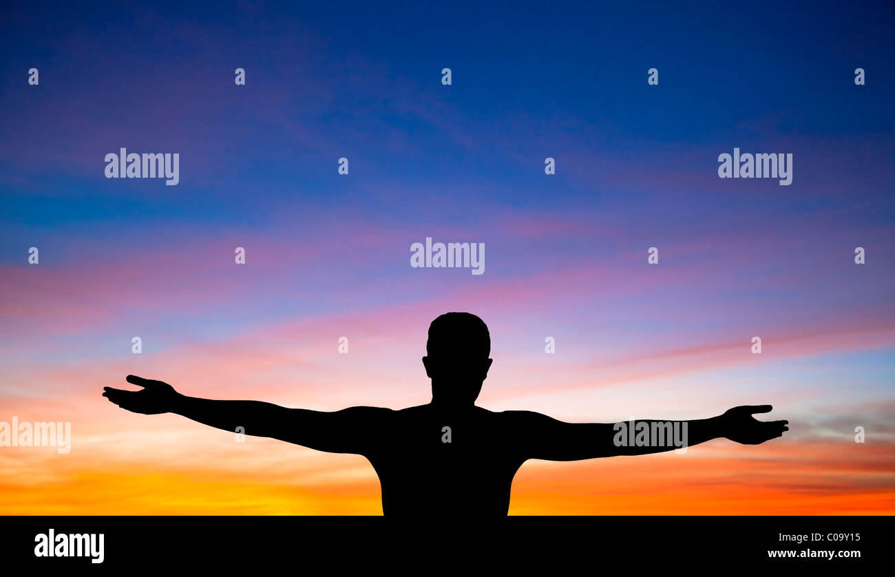 a silhouette of a man on background of beautiful sunset Stock Photo - Alamy