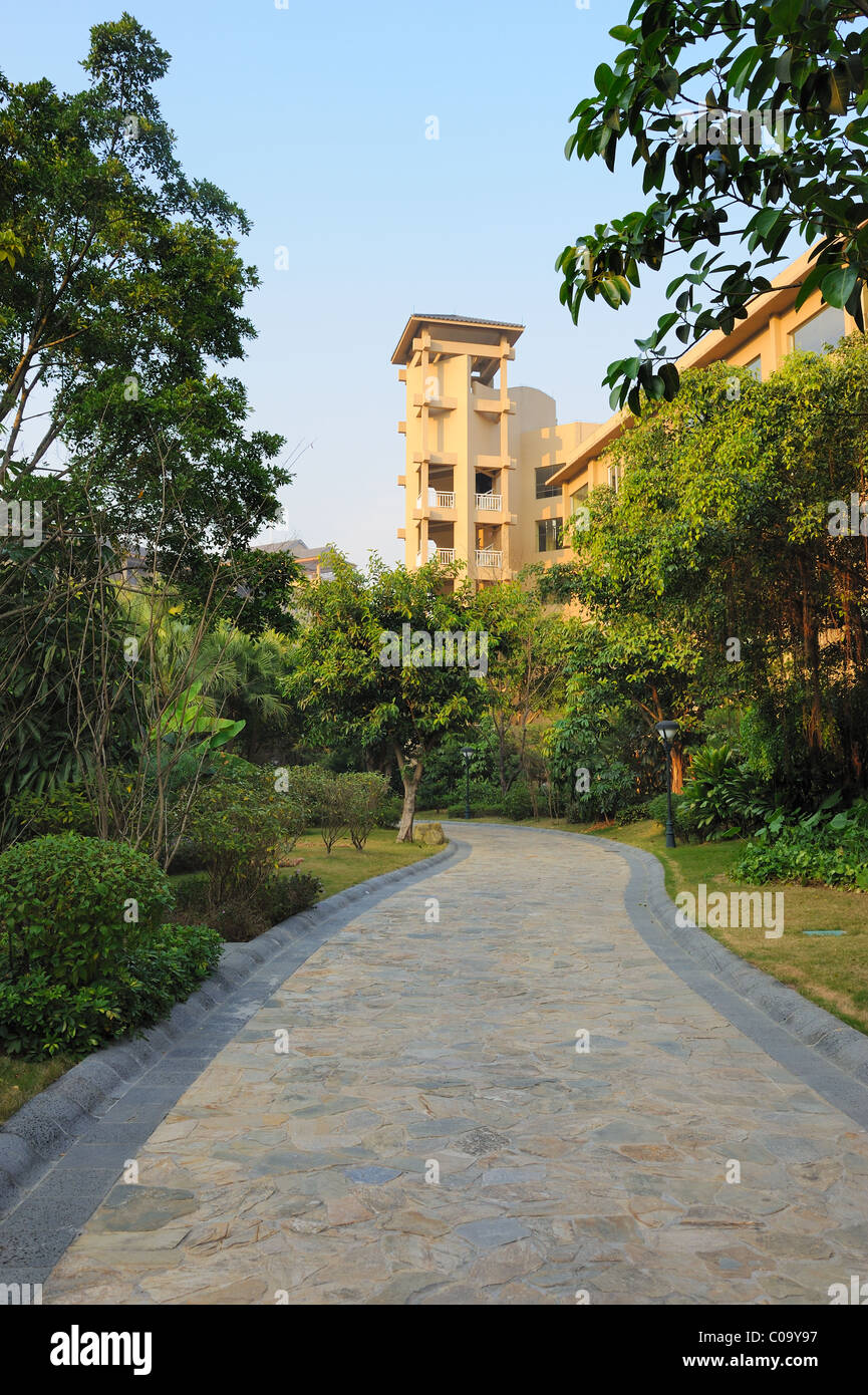 Road in the garden of a modern hotel Stock Photo