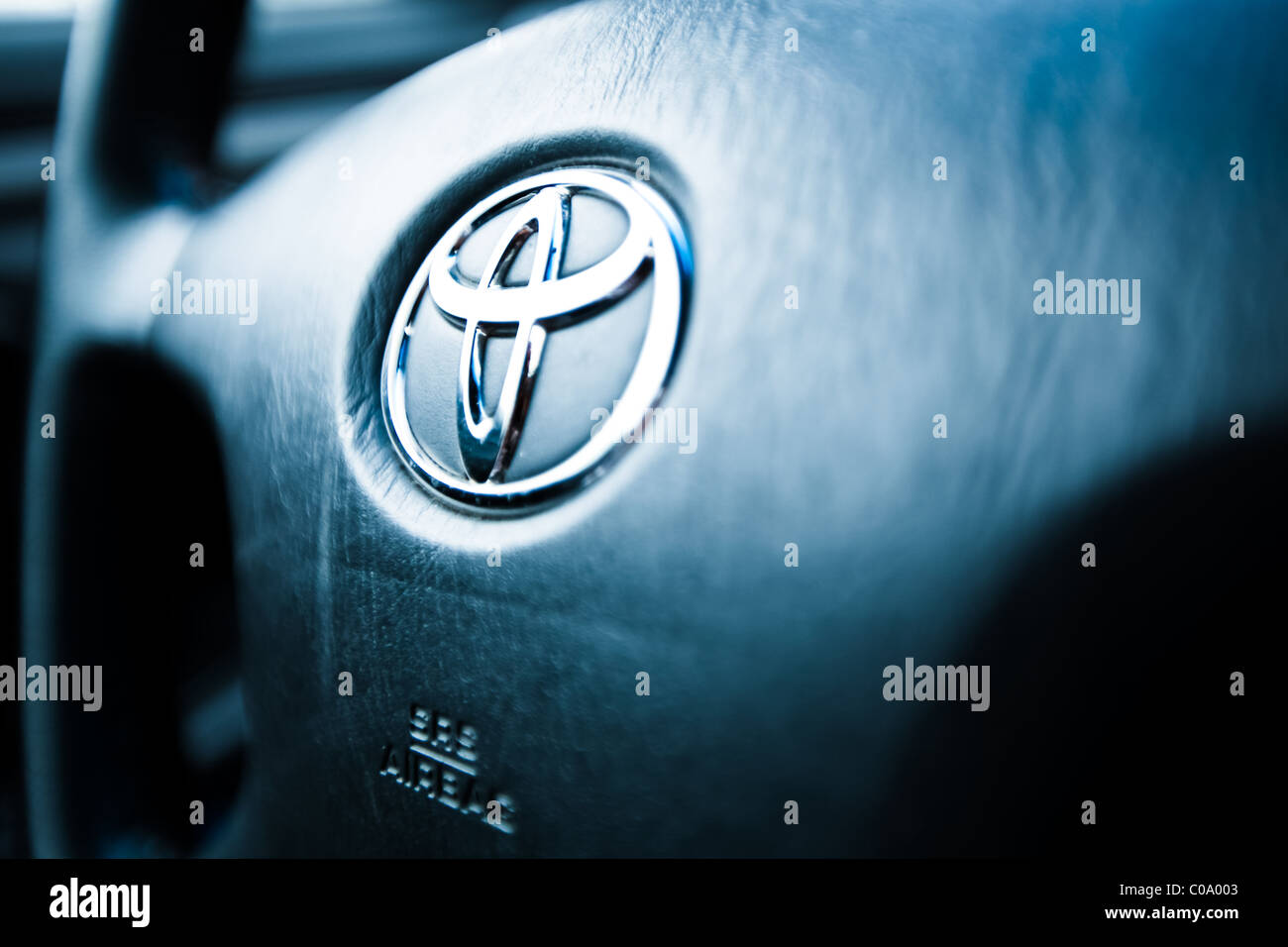Close up of Toyota logo on steering wheel Stock Photo